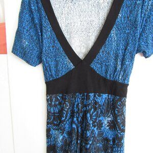 Sexy blouse by VENUS,  Size M,  modern blue floral print , EUC